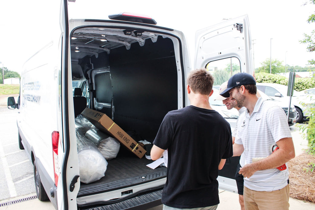 Our local white glove delivery team getting some mattresses ready to deliver to a customer. We deliver for free within 50 miles of Greenville.