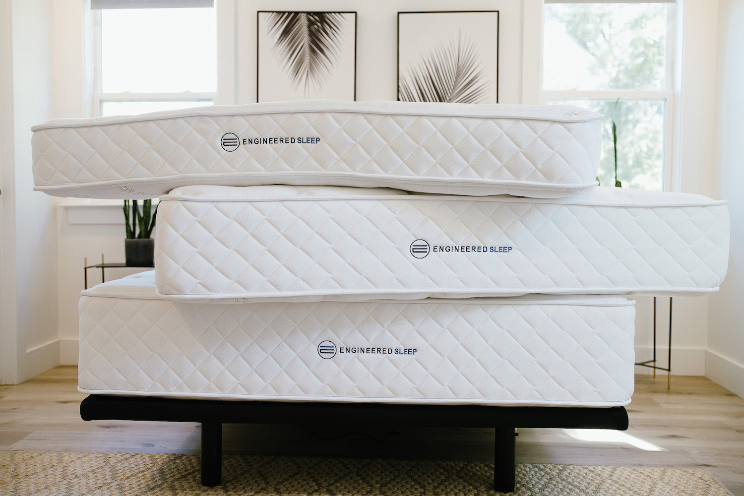 all our Classic Hybrid mattresses stacked on each other to showcases the different mattress options. These are traditional, flippable or double-sided mattresses.