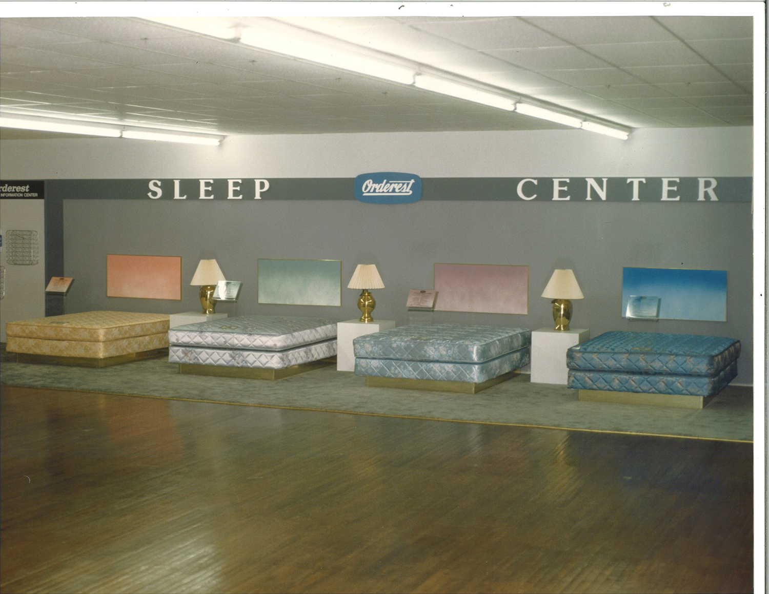 vintage photo of a mattress store showroom