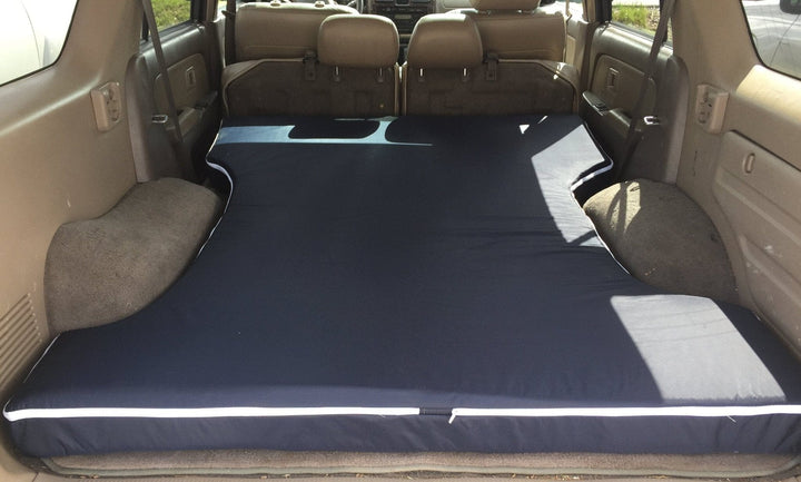 On-The-Go SUV Mattress in a car by Engineered Sleep